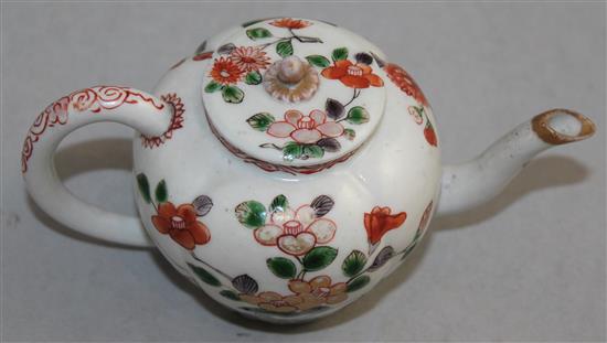 A rare Arita quatre-lobed small teapot and cover, late 17th century, 8.2cm, firing crack to body